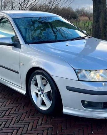 Saab 9-3 V6 Aero Sportwagon parked, showcasing its sleek silhouette and shiny alloy 17" wheels