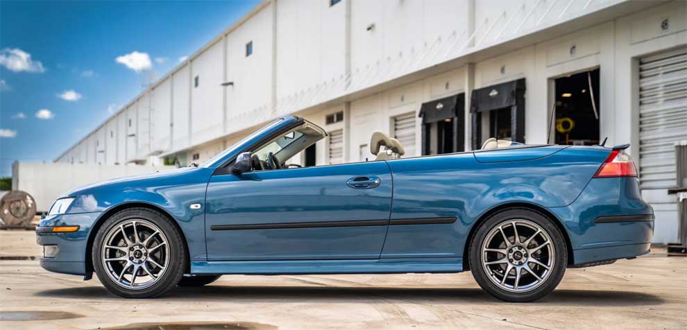 Side View of a 2007 Saab 9-3 2.0T Convertible in Fusion Blue Metallic with 18" Vors Wheels