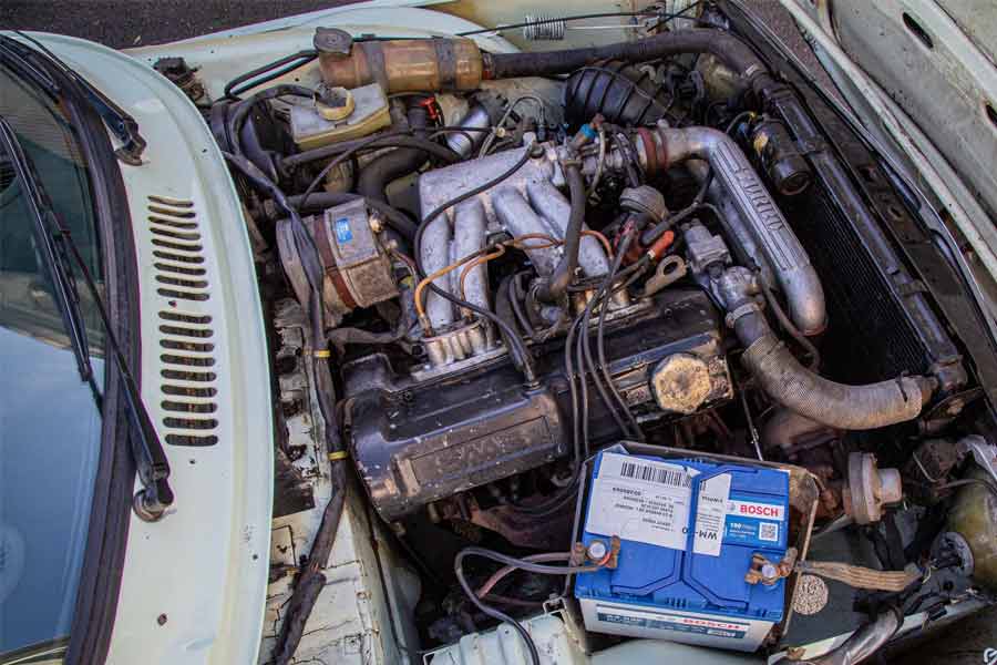 Authentic Vintage Powerhouse: The 1980 SAAB 99 Turbo Engine Bay, Ready for SAAB Heritage's Expert Restoration Touch