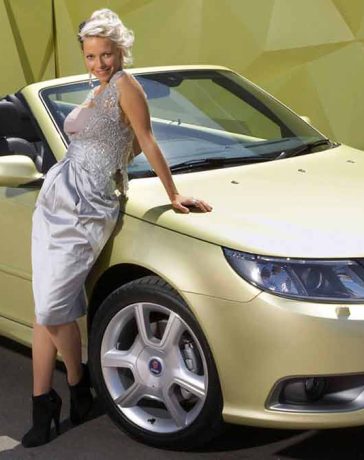 Official promotional image from the 2008 LA Auto Show, marking Saab's 25 years of convertible production, featuring the ultra-exclusive Bright Champagne Metallic 9-3 Convertible.