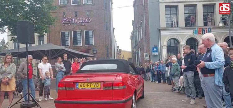 Eduard Mesritz's cherished red Saab makes a nostalgic appearance at the Lions IJsselvallei Classics rally, capturing the attention of car enthusiasts and spectators alike.