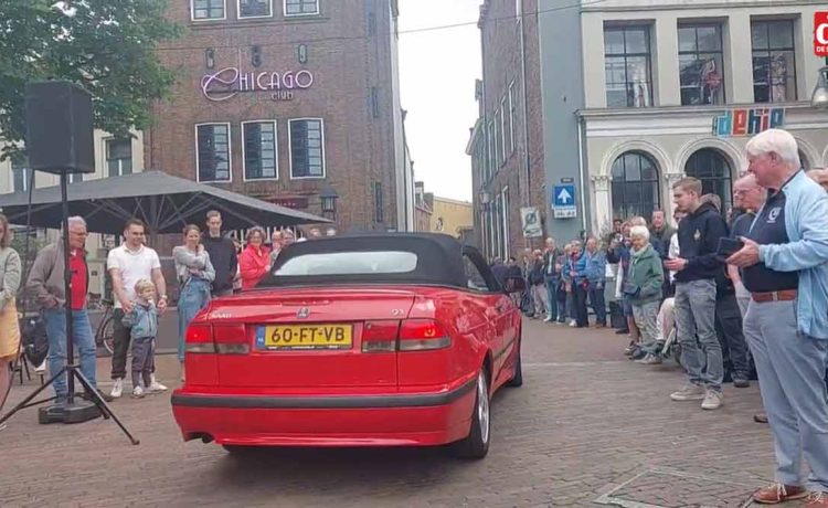 Eduard Mesritz's cherished red Saab makes a nostalgic appearance at the Lions IJsselvallei Classics rally, capturing the attention of car enthusiasts and spectators alike.