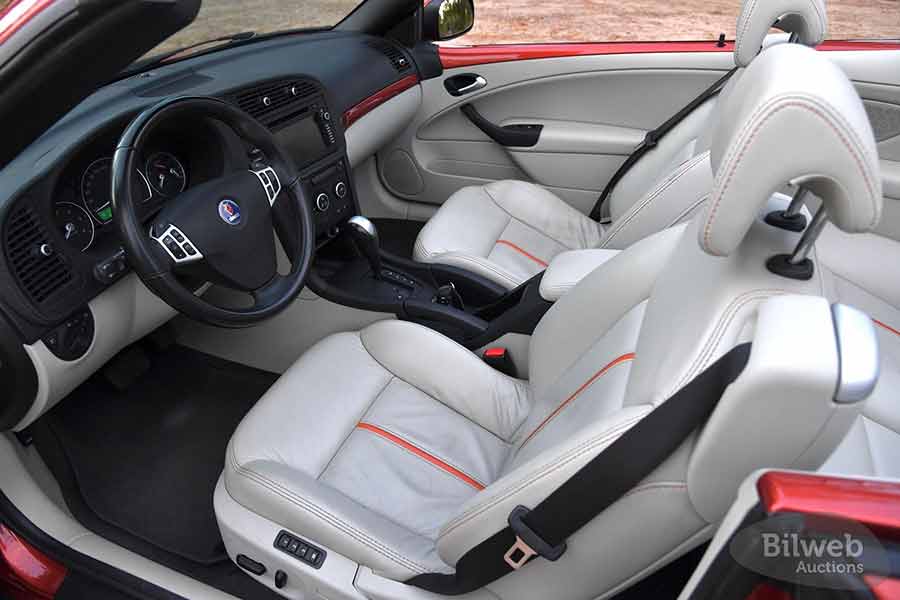 Unique interior of Saab 9-3 Independence Edition No.8—highlighting exclusive orange stitching and accents that underscore its one-of-a-kind design