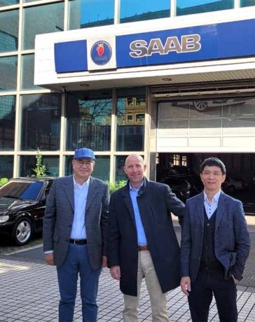 Jan-Philipp Schumacher in front of Scandinavia Asia Corporation headquarters with his hosts