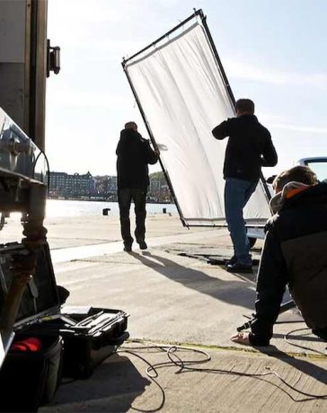 Johan Wedenström in his element, at work, with an iconic car in the focus of his lens, the Saab 9-3 Cabriolet