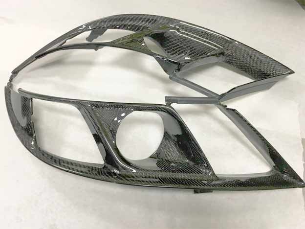 Saab 9-3 Turbo X headlight bezels.