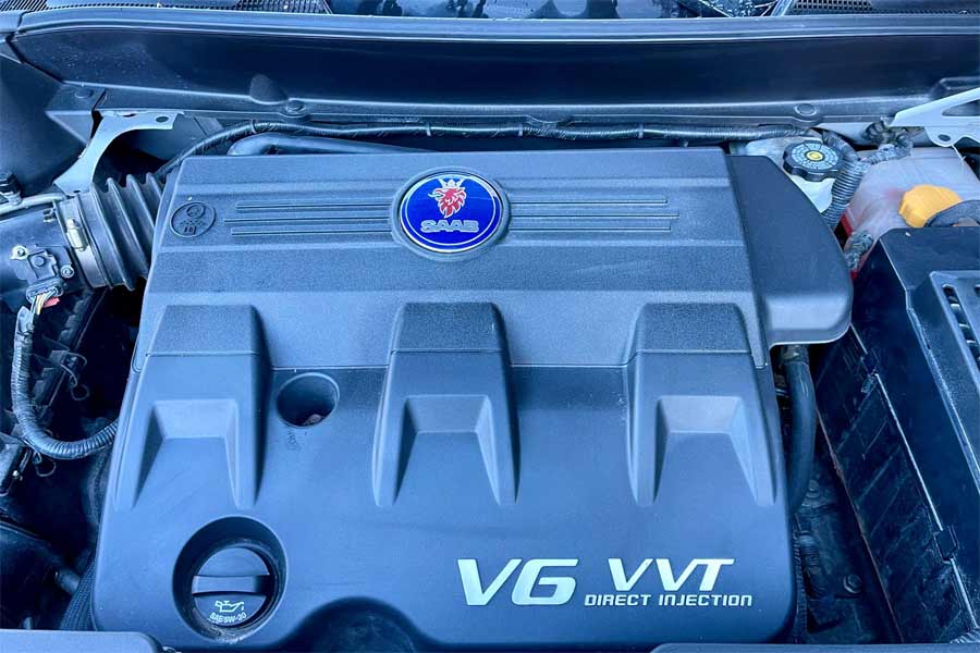 Under the hood: The powerful 3.0 V6 VVT engine of the Saab 9-4X, a marvel of engineering prowess and performance.