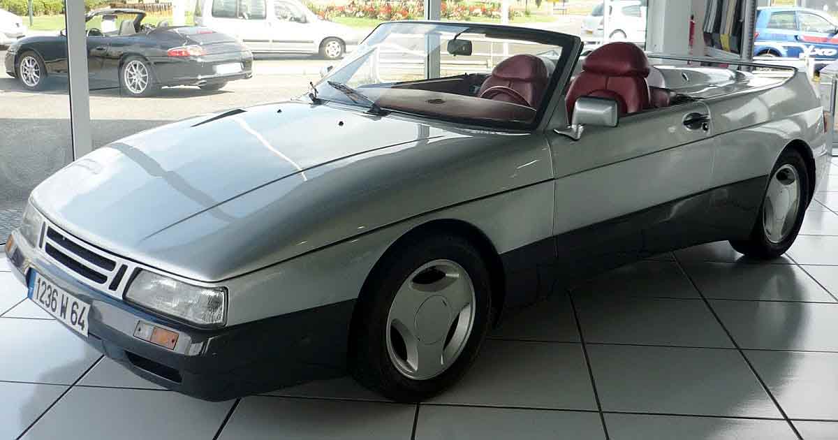 The Saab 900 Speeder on display at a showroom in Bayonne, France, showcasing its sleek design and unique features that make it a standout piece of automotive history.