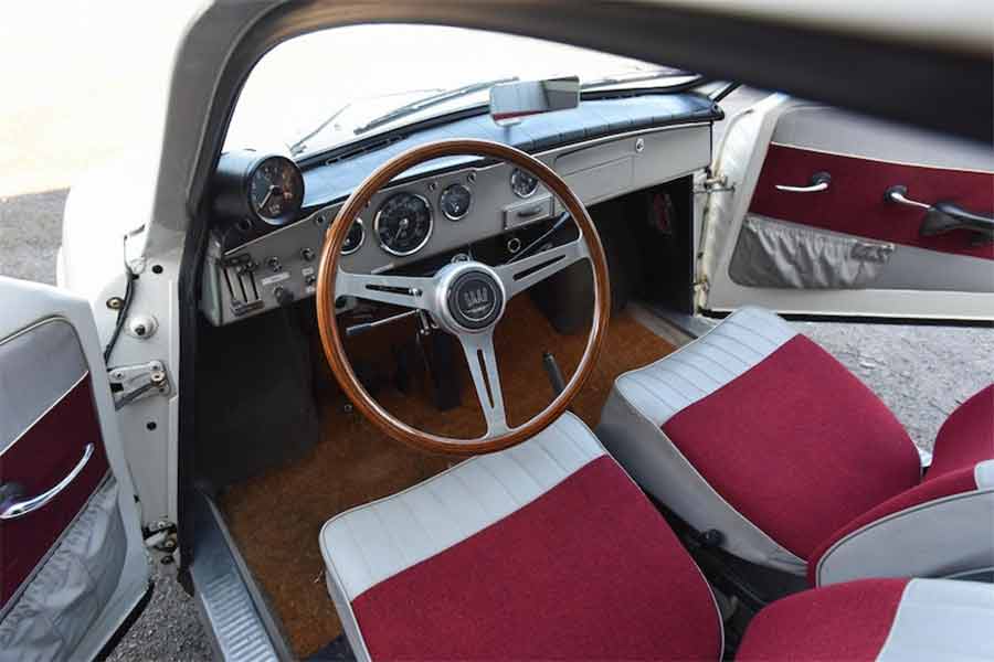 Step into automotive history with the 1964 SAAB 96's retro-inspired interior. Featuring a sleek and minimalist design, the cabin boasts original period-correct upholstery in pristine condition