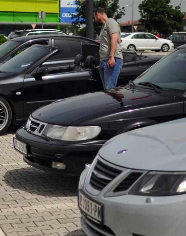 Saab enthusiasts gathered in Novi Sad, showcasing a variety of meticulously maintained Saab models.