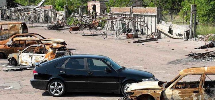 Amidst the war-torn landscape, Alexey Korobov's Saab 9-3 OG Aero stands as a symbol of resilience and determination, surpassing 300HP despite the devastation surrounding it.