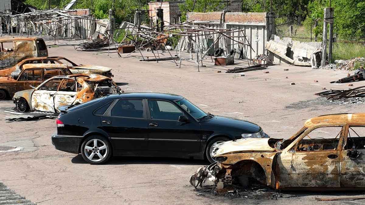 Amidst the war-torn landscape, Alexey Korobov's Saab 9-3 OG Aero stands as a symbol of resilience and determination, surpassing 300HP despite the devastation surrounding it.