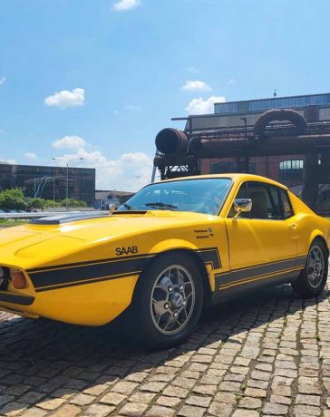 This vibrant yellow 1972 Saab Sonett III, originally red-orange, showcases its stunning transformation and meticulously maintained condition, standing as a testament to classic Swedish engineering and design.