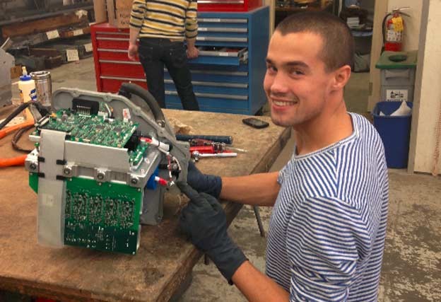 Adam Curtis works on his EV Saab Sonett