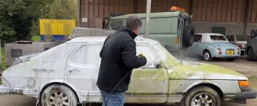 The 1985 Saab 900i barn find after its first wash in over 20 years – rusted but resilient, awaiting its next chapter.