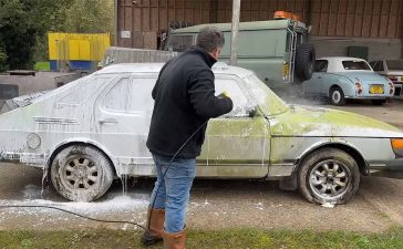 The 1985 Saab 900i barn find after its first wash in over 20 years – rusted but resilient, awaiting its next chapter.