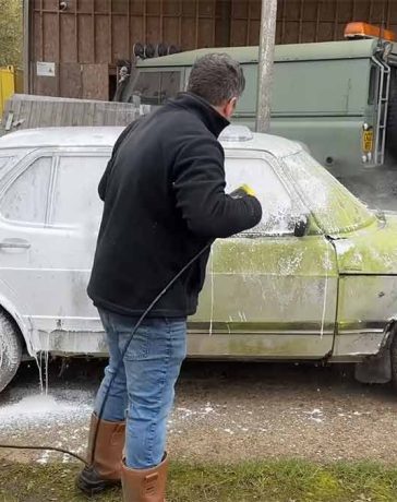 The 1985 Saab 900i barn find after its first wash in over 20 years – rusted but resilient, awaiting its next chapter.