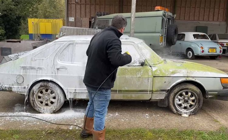 The 1985 Saab 900i barn find after its first wash in over 20 years – rusted but resilient, awaiting its next chapter.