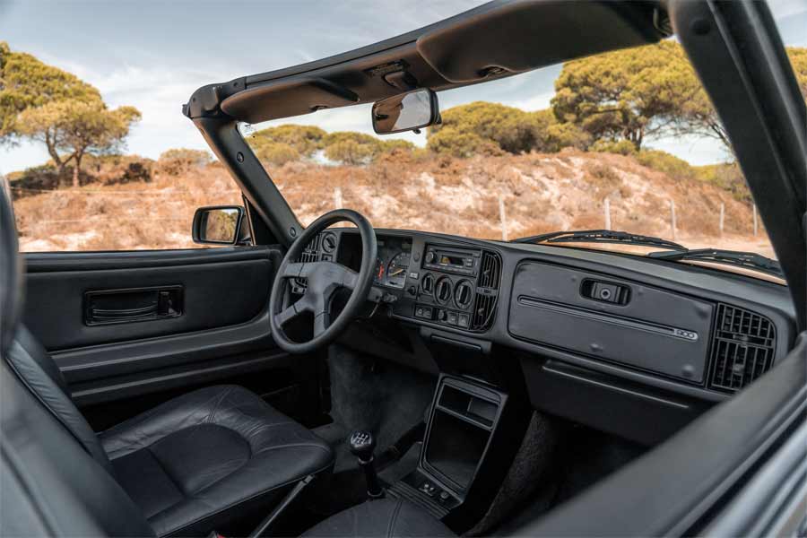 Dark and Majestic: The Black Saab 900 Convertible 'Aero', Cloaked in Black Inside and Out, Echoing the Imposing Aura of Darth Vader