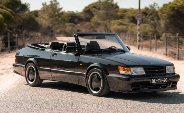 An Elegant Vision in Black: The Restored 1987 Saab 900 Turbo Cabrio 'Aero' in its Full Glory, Symbolizing a Rich Blend of History, Performance, and Swedish Craftsmanship