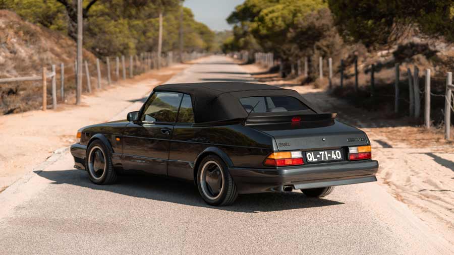 Elegant Sophistication: The Black Saab 900 Convertible 'Aero' Outshines Even the Vibrant Monte Carlo Yellow with Its Understated, Timeless Grace