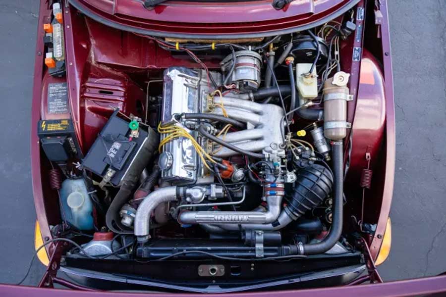 Under the Hood of the 1978 Saab 99 Turbo: A Pristine Engine Bay, Reflecting Meticulous Maintenance and Timeless Engineering Excellence