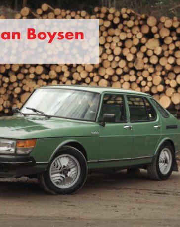 Jens Christian Boysen, the passionate automotive enthusiast, stands proudly beside his cherished 1980 Saab 900 Turbo, a timeless symbol of Nordic design and automotive history.