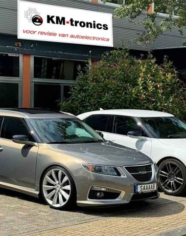 A pair of rare Saab 9-5NG models, including a white Hirsch Performance edition, visiting KM-tronics. These enthusiasts rely on KM-tronics for OEM-quality refurbished parts, helping to keep their unique Saab vehicles running and looking pristine.