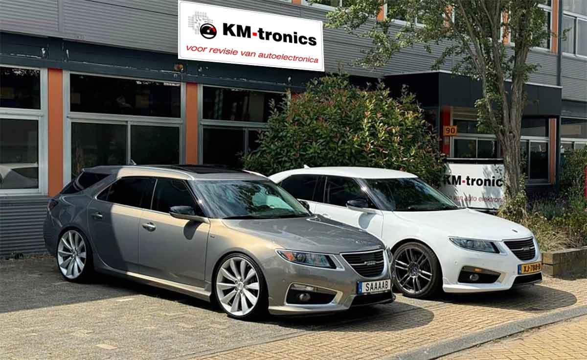 A pair of rare Saab 9-5NG models, including a white Hirsch Performance edition, visiting KM-tronics. These enthusiasts rely on KM-tronics for OEM-quality refurbished parts, helping to keep their unique Saab vehicles running and looking pristine.