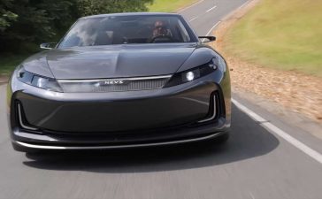 The NEVS Emily GT, according to Top Gear's Tom Ford, feels like a normal electric super saloon with fast acceleration, precise steering, and impressive handling capabilities, making it a truly remarkable driving experience.