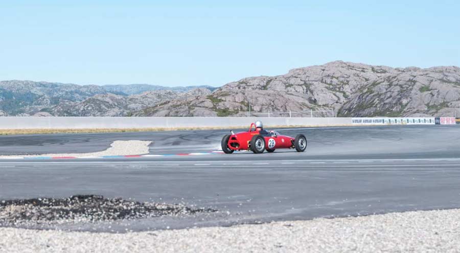 Speed and Precision: The Saab Quantum IV Dominates the Racetrack with Agile Performance Against a Breathtaking Backdrop. (Photo by Lauritz A. Heskje)