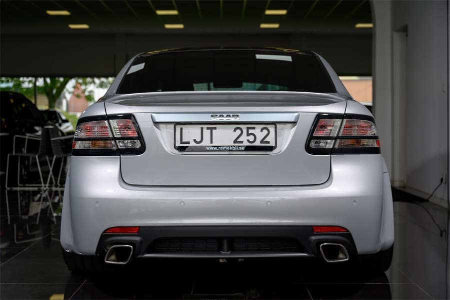 Rear view of the 2008 Saab 9-3 Aero SportSedan, showcasing its wide-body design, Turbo X exhaust system, and rear diffuser, highlighting the aggressive and sporty enhancements that complement its 700 horsepower performance.