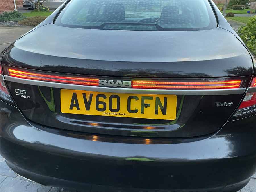 Rear View of the 2010 Saab 9-5 Aero: Highlighting the fully functional LED bar, often a challenge in this model due to moisture ingress, yet flawlessly operational here.