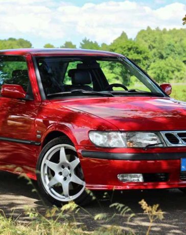 Unleash the Power: The red Saab 9-3 Aero Coupe exudes elegance and performance, with its sleek design and impressive modifications. Get ready for an exhilarating ride that combines style, speed, and Saab heritage.