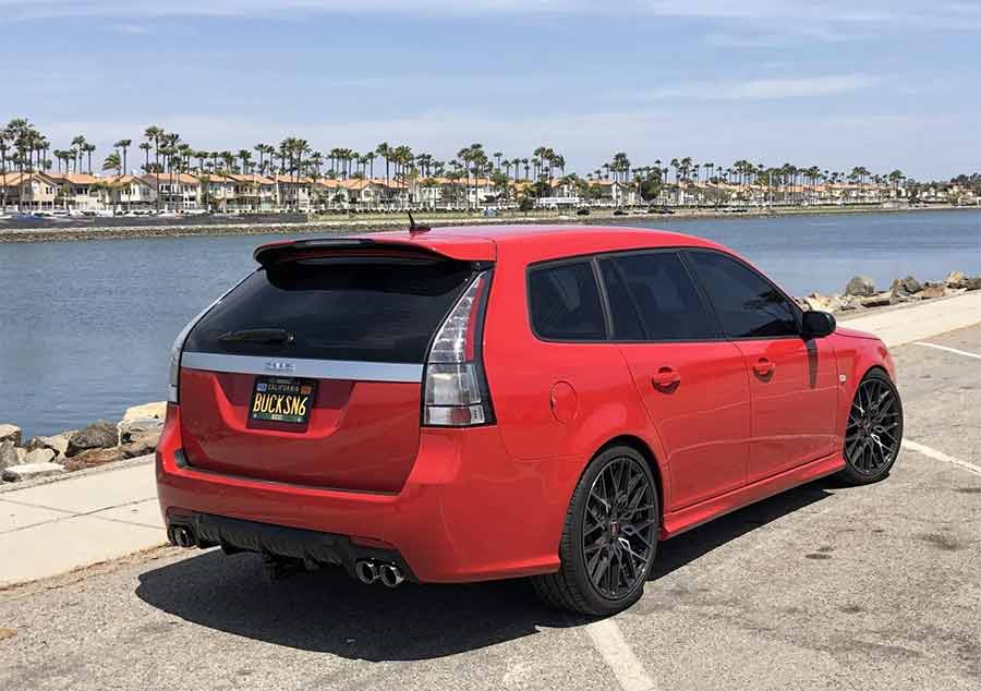 This heavily modified 2008 Saab 9-3 Aero SportCombi in striking Laser Red has seen a rollercoaster resale journey—once a $21,500 auction record-breaker, it later sold for just $10,000. A prime example of how niche performance mods can make or break a car’s market value.