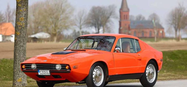 A gleaming Saab Sonett III, Sweden's answer to the Corvette, is now up for auction, showcasing the engineering prowess of Trollhättan. With a V4 engine born from a halved V8, this shining sports car represents Saab's unique take on performance and style