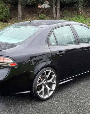 Behold the Saab 9-3 TTiD—a sleek black beauty with its aerodynamic body and attention-grabbing 19-inch VXR-style wheels.