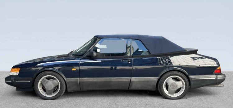 The 1992 Saab 900 Turbo S Aero Convertible in pristine condition, showcasing its iconic design and timeless elegance with the top up. A true classic offered by Auto Tjuvholmen.