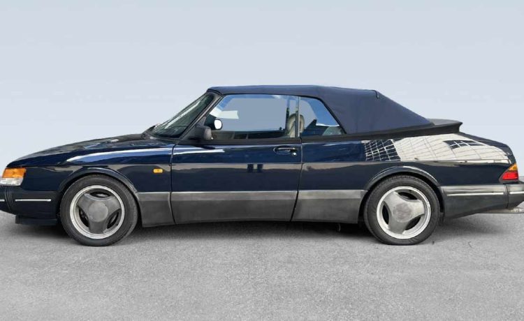 The 1992 Saab 900 Turbo S Aero Convertible in pristine condition, showcasing its iconic design and timeless elegance with the top up. A true classic offered by Auto Tjuvholmen.