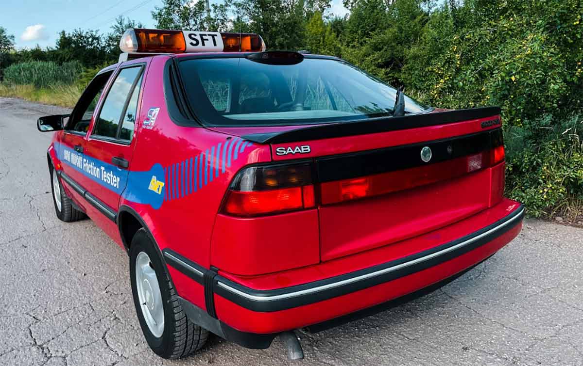  the rare 1996 Saab 9000 SFT, highlighting its distinctive markings as a friction tester vehicle. Restored to pristine condition, it showcases the legacy of Saab's commitment to innovation and safety.