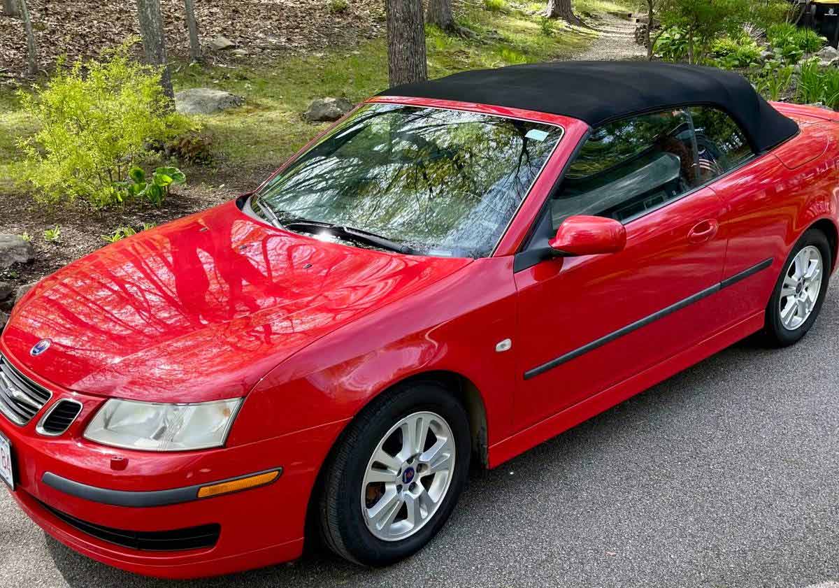 Experience the Thrill of the Open Road with the Laser Red 2007 Saab 9-3 Turbo Convertible: Unleash Your Summer and Fall Driving Dreams!"