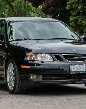 Pristine 2007 Saab 9-3 SportCombi in glossy black, showcasing its sleek design and elegant stance