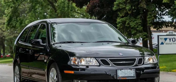 Pristine 2007 Saab 9-3 SportCombi in glossy black, showcasing its sleek design and elegant stance