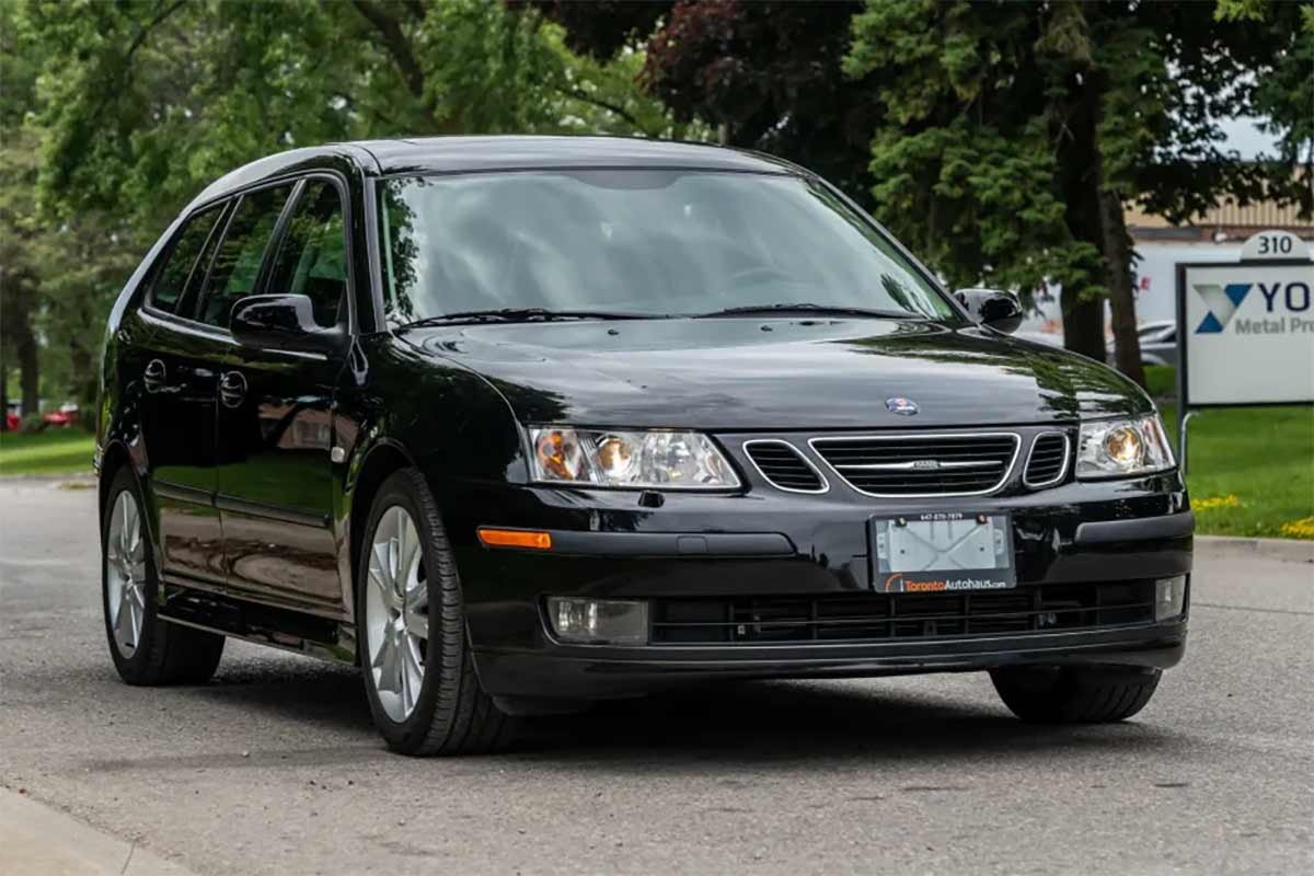 Pristine 2007 Saab 9-3 SportCombi in glossy black, showcasing its sleek design and elegant stance