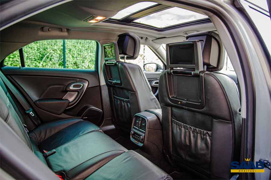 Luxury Meets Tech: The Saab 9-5 NG Aero's Rear Seats, Complete with Personal LCD Screens for a First-Class Travel Experience