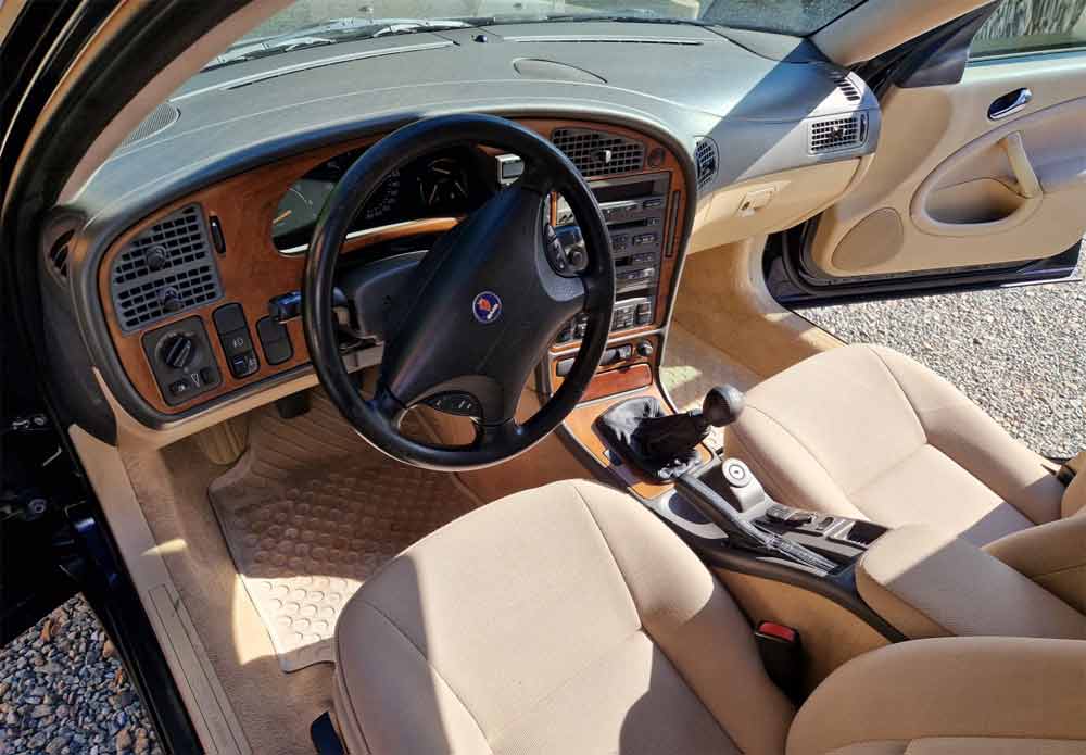 Unique Elegance: The Non-Aero 'Linear' Saab 9-5 with Pristine Beige Fabric Interior