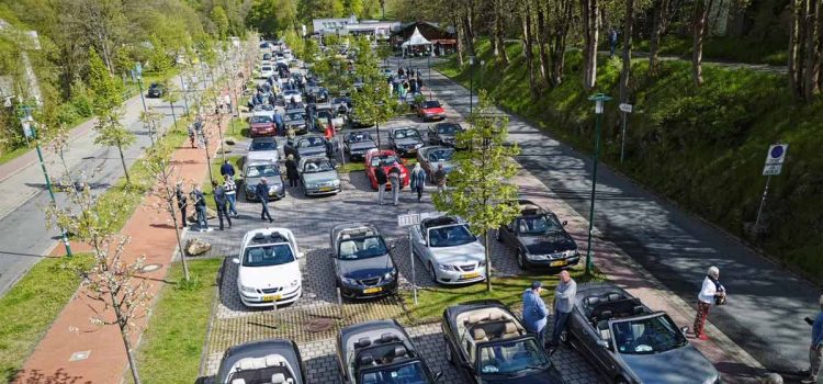 Enthusiasts and their cherished Saab convertibles line up for a picturesque gathering during the 2024 Saab Convertible Weekend at Nationalpark Harz, showcasing a vibrant display of community and automotive passion (photo by David Joost Kamermans)