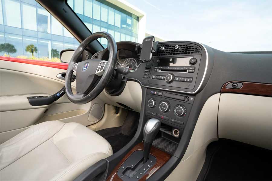 The plush beige leather interior of the 2008 Saab 9-3 Convertible, perfectly complementing Florida's sunny disposition and warm climate