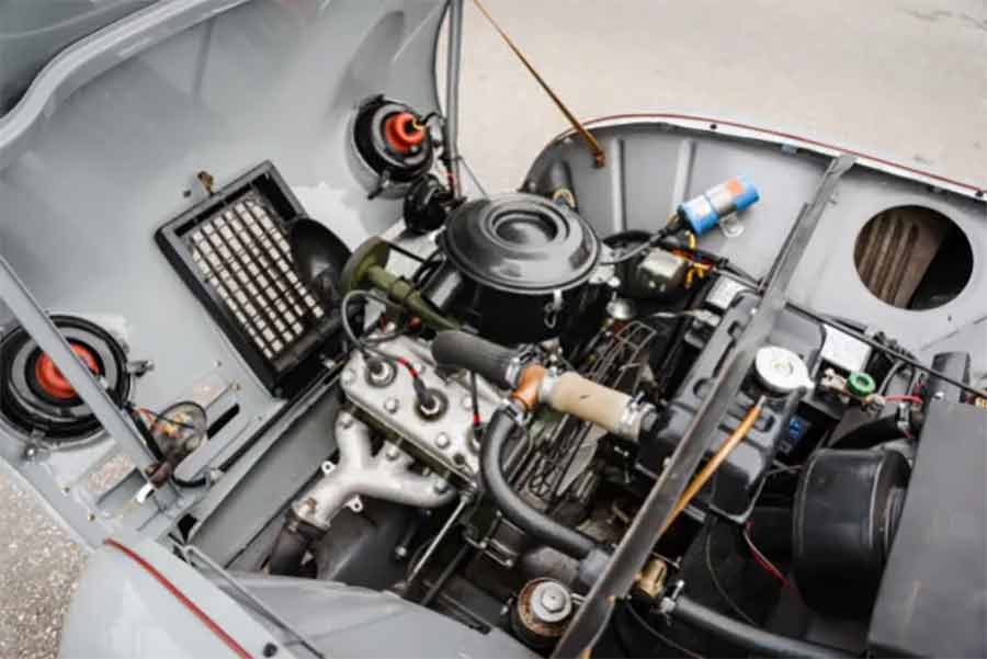 The heart of the 1957 Saab 93A—a 750cc two-stroke inline-three engine, expertly tuned by former Saab competition mechanic Bengt-Erik Ström, delivering rally-ready performance.