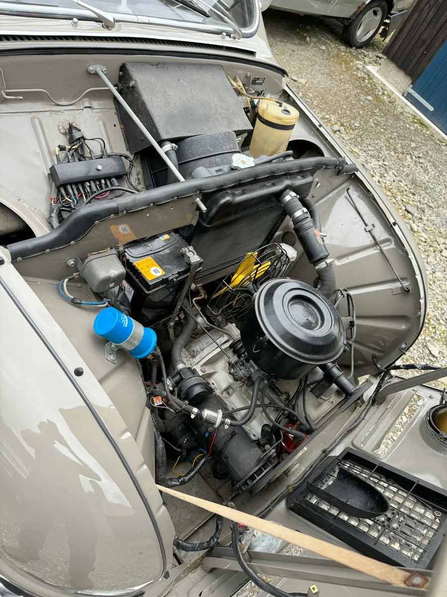 Under the hood of the 1964 Saab 96, its 841cc two-stroke engine remains in excellent condition, benefiting from a recent rebuild and reflecting years of meticulous care and maintenance.